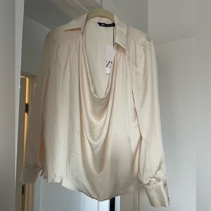 Fluid neckline satin effect blouse Zara